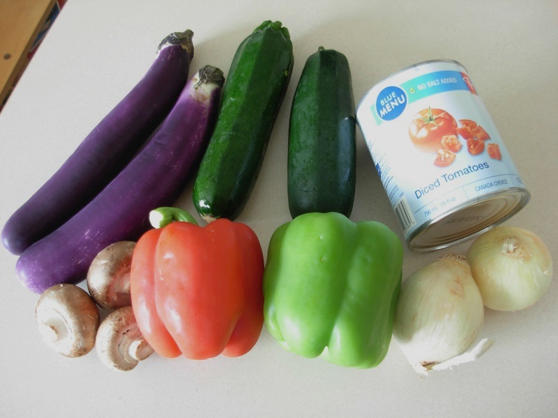 Ingredients for ratatouille: eggplant, zucchini, tomato, mushroom, bell pepper, onion